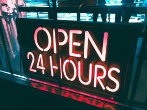 Sign displaying Open 24 hours