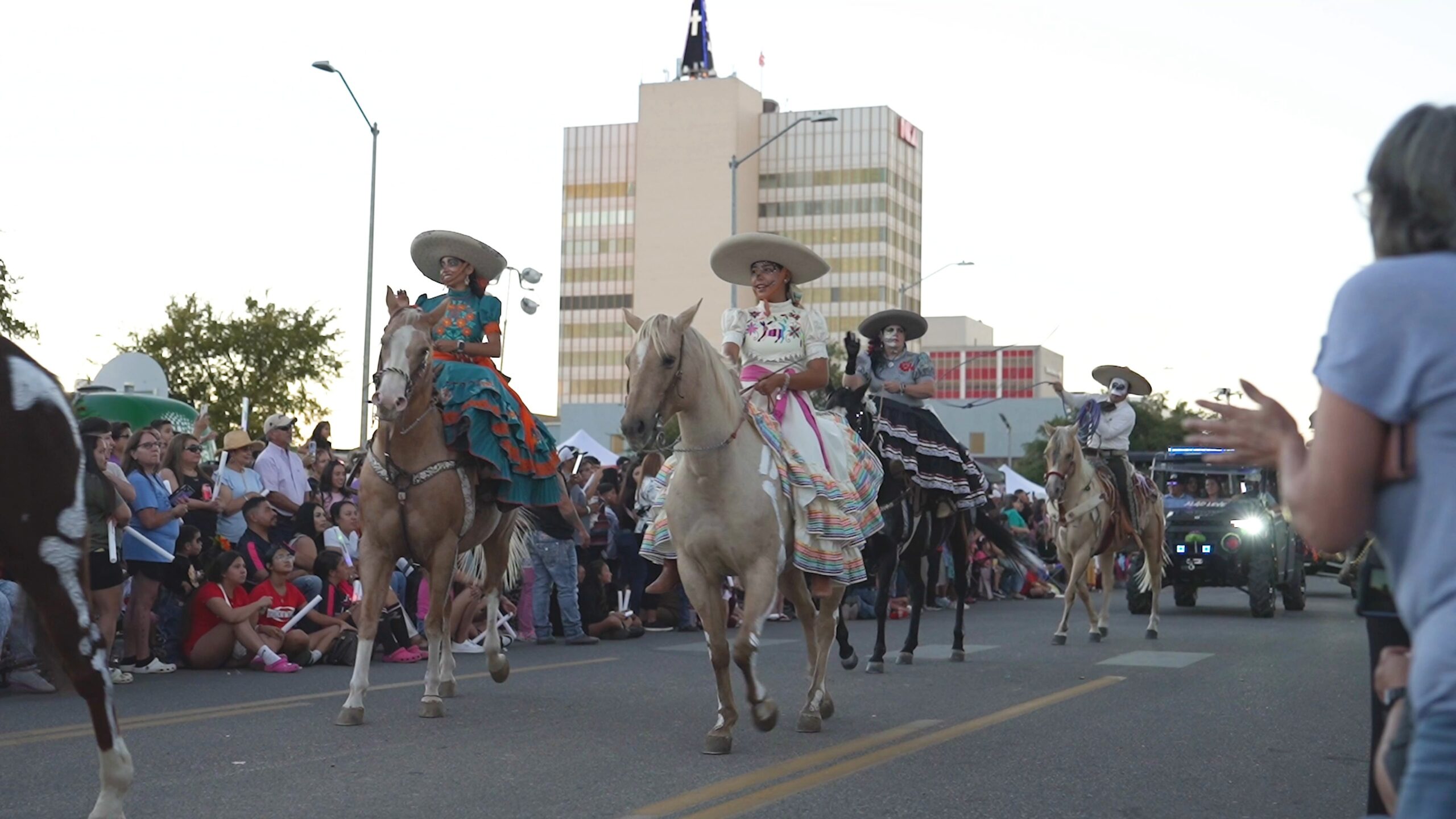 Celebrating-Dia-De-Los-Muertos-Odessa-Texas.mp4_snapshot_01.50.110 Celebrating Dia de Los Muertos - Parade showing image of horse riding